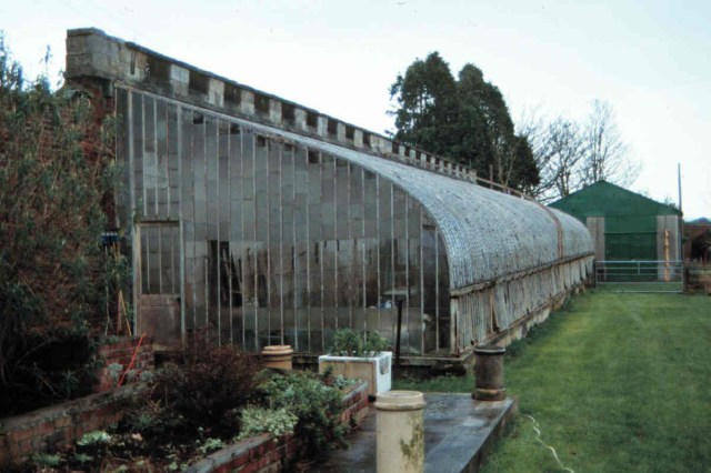 Unoccupied greenhouse of circa 1830 that incorporates an C18 garden wall. In very bad condition. English Heritage offered a grant in August 2011 to allow a repair scheme to be drawn up. Funding to allow repairs to be undertaken is being explored. http://risk.english-heritage.org.uk/register.aspx?id=46382&rt=1&pn=2&st=a&ua=Northumberland+(UA)&ctype=all&crit=