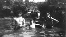 Undated photo of the family using swimming pond National Trust