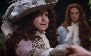 Stanley Tucci as the Duc of Orleans, Louis's brothrScreenshot from the official trailer https://www.youtube.com/watch?v=UOmEoP9PCYg