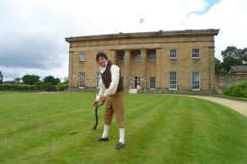 The Historic Gardener tending the lawn at Belsay Hall